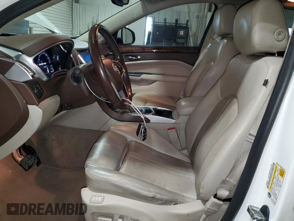 2015 Cadillac SRX Performance Collection with VIN 3GYFNCE36FS531134, listed as a Copart auction lot 54862205 with 103,051 mi miles and Clean title. Bid and sale history available at DreamBid. Image 7.