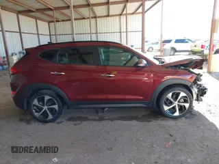 2016 Hyundai Tucson Limited with VIN KM8J33A21GU069937, listed as a IAAI auction lot 41861070 with 126,716 mi miles. Bid and sale history available at carsss.com. Image 13.