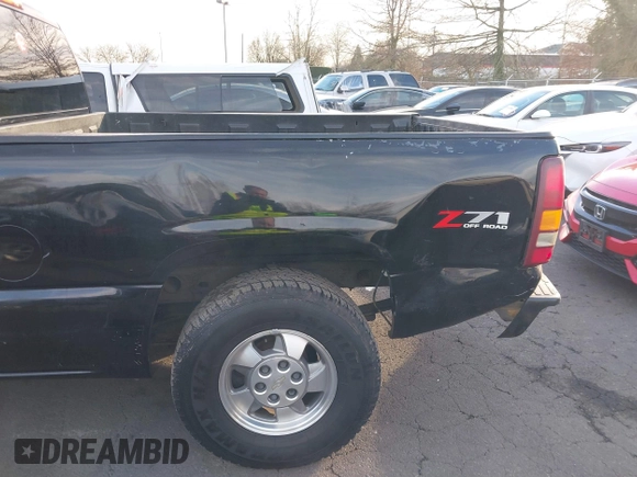 2002 Chevrolet Silverado 1500 LT with VIN 1GCEK19T42E150069, listed as a IAAI auction lot 41401949 with 105,099 mi miles. Bid and sale history available at carsss.com. Image 6.