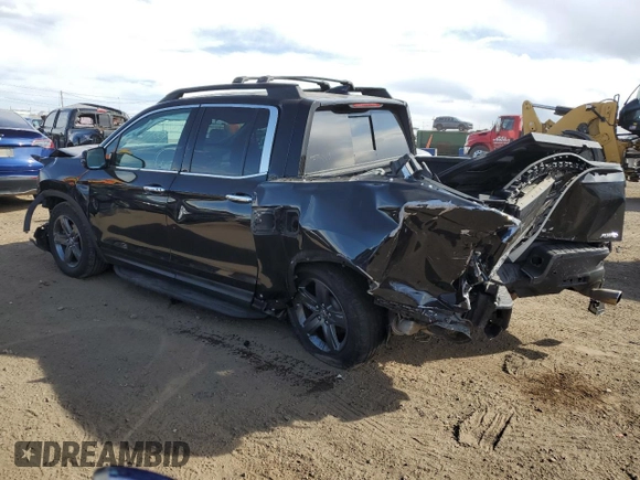 2023 Honda Ridgeline RTL-E with VIN 5FPYK3F71PB024149, listed as a Copart auction lot 50767465 with 40,943 mi miles and Salvage title. Bid and sale history available at DreamBid. Image 2.