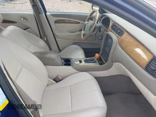 2004 Jaguar S-Type z VIN SAJEA01T34FN00637, wystawiony jako IAAI lot #42314620 z przebiegiem Nie podano mil oraz . Historia ofert i sprzedaży dostępna na DreamBid. Obrazek 5.
