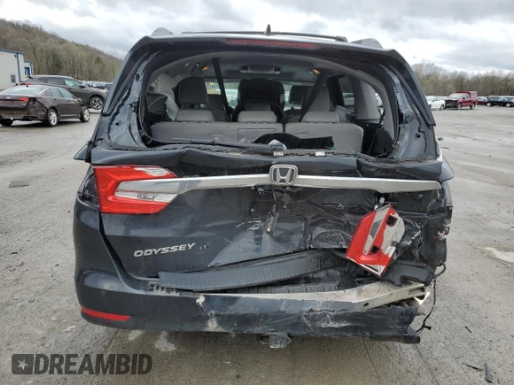 2019 Honda Odyssey Elite с VIN 5FNRL6H93KB002995, выставлен на аукционе Copart как лот 53271475 с пробегом 87 593 миль миль и Списание • Salvage title. История ставок и продаж доступна на DreamBid. Изображение 6.