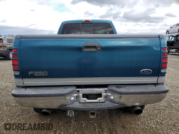2000 Ford F-250 XL с VIN 1FTNX21LXYEA93291, выставлен на аукционе Copart как лот 51086605 с пробегом Не указан миль и Списание • Salvage title. История ставок и продаж доступна на DreamBid. Изображение 6.
