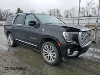 2023 GMC Yukon Denali with VIN 1GKS1DKL8PR402542, listed as a Copart auction lot 42001695 with 23,497 mi miles and Salvage Title. Bid and sale history available at carsss.com. Image 4.