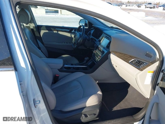 2016 Hyundai Sonata Hybrid Limited with VIN KMHE34L19GA020739, listed as a IAAI auction lot 41649497 with 217,744 mi miles. Bid and sale history available at carsss.com. Image 5.
