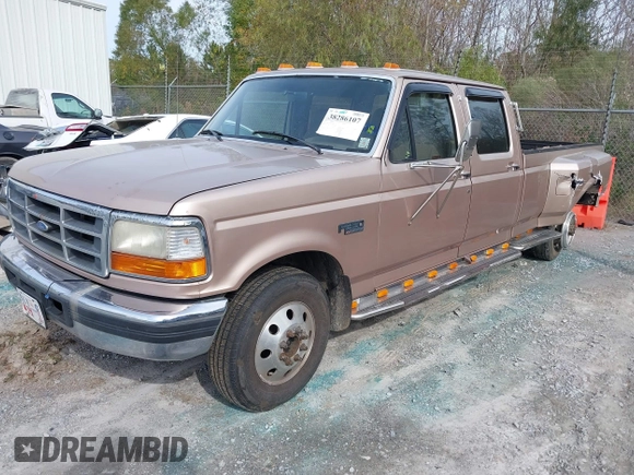 1997 Ford F-350 z VIN 1FTJW35G7VEC80262, wystawiony jako IAAI lot #38286107 z przebiegiem 158 206 mil mil oraz . Historia ofert i sprzedaży dostępna na DreamBid. Obrazek 17.