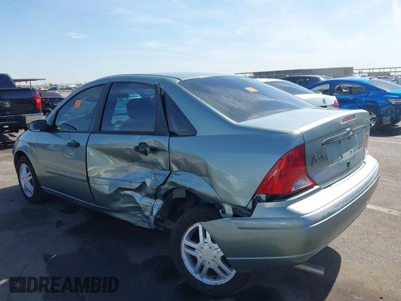 2003 Ford Focus SE with VIN 1FAFP34P53W162793, listed as a IAAI auction lot 42385636 with Not provided miles and . Bid and sale history available at DreamBid. Image 3.