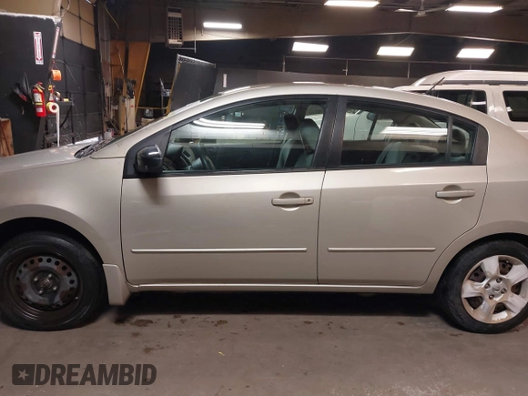 2009 Nissan Sentra S FE+ z VIN 3N1AB61E19L655492, wystawiony jako IAAI lot #42169403 z przebiegiem 131 164 mil mil oraz . Historia ofert i sprzedaży dostępna na DreamBid. Obrazek 14.