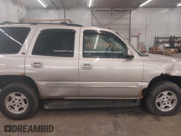 2004 Chevrolet Tahoe Z71 with VIN 1GNEK13Z94R252242, listed as a IAAI auction lot 42354997 with 240,719 mi miles and . Bid and sale history available at DreamBid. Image 14.