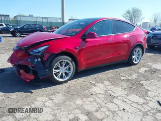 2021 Tesla Model Y Standard Range with VIN 5YJYGDED1MF111410, listed as a IAAI auction lot 41942323 with 24,836 mi miles. Bid and sale history available at carsss.com. Image 2.