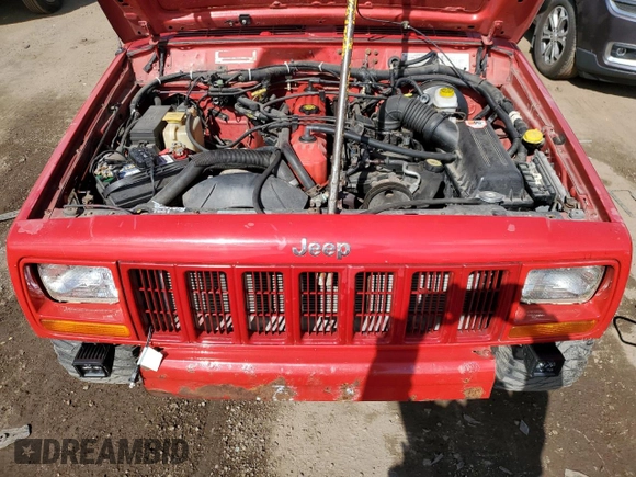 2000 Jeep Cherokee with VIN 1J4FF48S0YL113246, listed as a Copart auction lot 51861455 with 180,965 mi miles and Clean title. Bid and sale history available at DreamBid. Image 11.