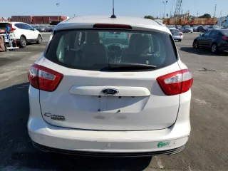 2015 Ford C-Max Energi SEL with VIN 1FADP5CU7FL124420, listed as a Copart auction lot 61145393 with 110,319 mi miles. Bid and sale history available at carsss.com. Image 6.
