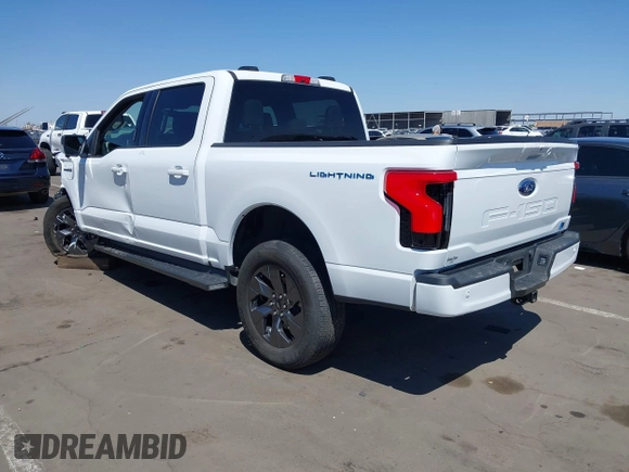 2023 Ford F-150 Lightning Pro with VIN 1FTVW1EL4PWG42578, listed as a IAAI auction lot 41992446 with 26,729 mi miles and . Bid and sale history available at DreamBid. Image 3.