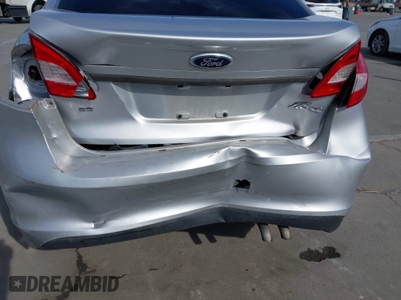 2012 Ford Fiesta SE with VIN 3FADP4BJ2CM150953, listed as a IAAI auction lot 42010904 with 77,637 mi miles. Bid and sale history available at carsss.com. Image 6.