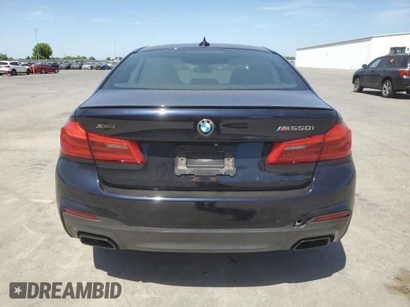 2019 BMW 5 Series M550i xDrive with VIN WBAJB9C5XKB287877, listed as a Copart auction lot 52994065 with 52,460 mi miles and Salvage title. Bid and sale history available at DreamBid. Image 6.