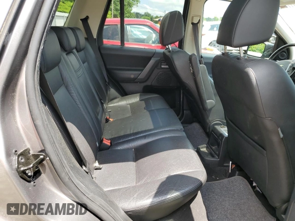 2010 Land Rover LR2 HSE with VIN SALFR2BN5AH191866, listed as a Copart auction lot 60617335 with 154,409 mi miles and Salvage title. Bid and sale history available at DreamBid. Image 11.