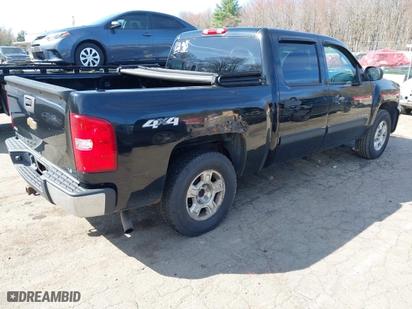 2011 Chevrolet Silverado 1500 LS with VIN 3GCPKREA4BG353984, listed as a IAAI auction lot 42094148 with 218,766 mi miles. Bid and sale history available at carsss.com. Image 4.