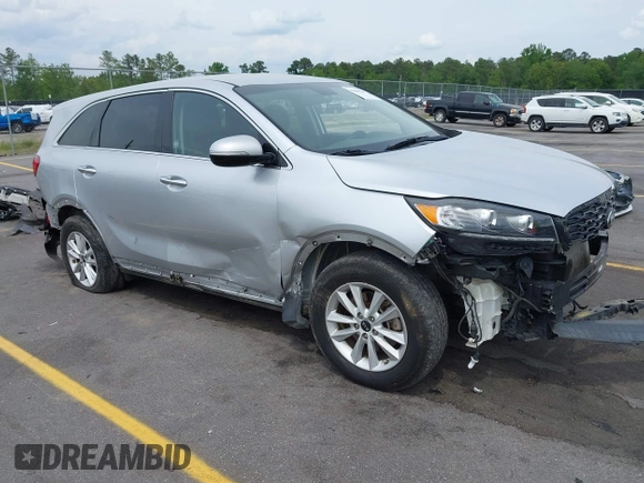 2019 Kia Sorento L z VIN 5XYPG4A36KG593306, wystawiony jako IAAI lot #42084345 z przebiegiem 115 241 mil mil oraz . Historia ofert i sprzedaży dostępna na DreamBid. Obrazek 1.