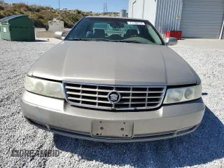 2000 Cadillac Seville Touring STS z VIN 1G6KY5498YU255607, wystawiony jako Copart lot #71130714 z przebiegiem 146 046 mil mil oraz Szkoda całkowita • Salvage title. Historia ofert i sprzedaży dostępna na DreamBid. Obrazek 5.