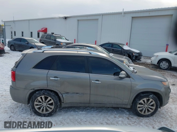 2012 Kia Sorento SX with VIN 5XYKWDA26CG192585, listed as a IAAI auction lot 41628229 with 148,613 mi miles. Bid and sale history available at carsss.com. Image 13.