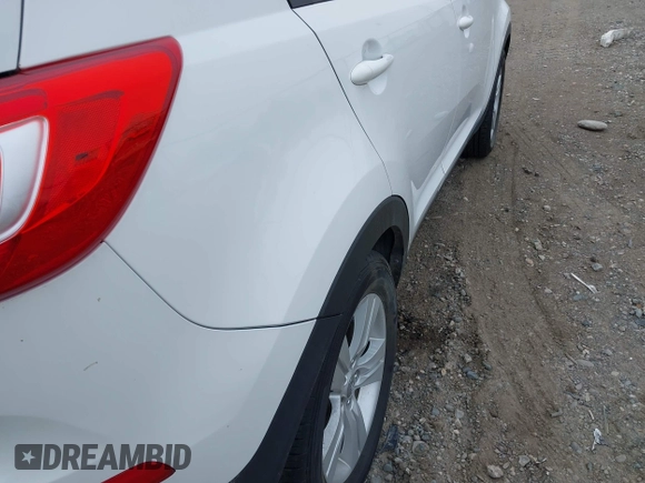 2012 Kia Sportage LX with VIN KNDPBCA2XC7265644, listed as a IAAI auction lot 42094710 with 137,933 mi miles and . Bid and sale history available at DreamBid. Image 14.