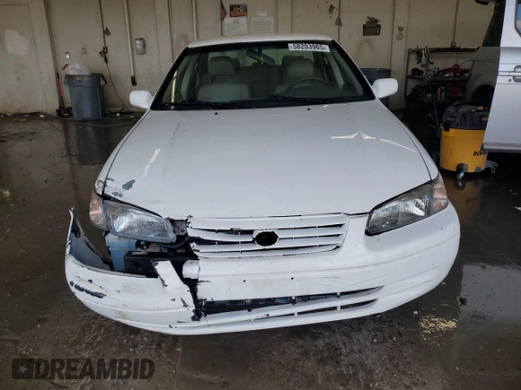 1999 Toyota Camry LE с VIN JT2BG22K3X0317823, выставлен на аукционе Copart как лот 58203965 с пробегом 167 587 миль миль и Списание • Salvage title. История ставок и продаж доступна на DreamBid. Изображение 5.