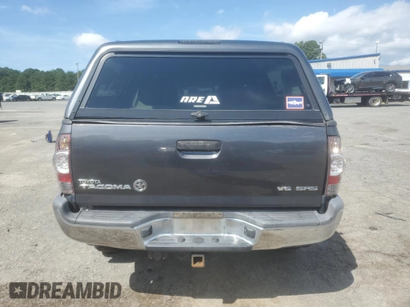 2014 Toyota Tacoma with VIN 3TMLU4EN2EM163797, listed as a Copart auction lot 61078805 with 130,748 mi miles and Salvage title. Bid and sale history available at DreamBid. Image 6.