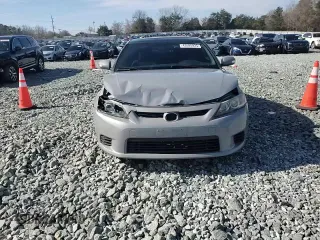 2012 Scion tC z VIN JTKJF5C78C3040542, wystawiony jako Copart lot #43595925 z przebiegiem 160 106 mil mil oraz Szkoda całkowita • Salvage title. Historia ofert i sprzedaży dostępna na DreamBid. Obrazek 10.