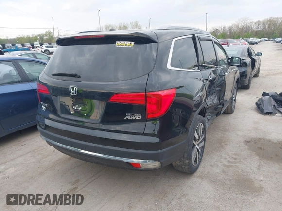 2017 Honda Pilot Touring with VIN 5FNYF6H93HB028122, listed as a IAAI auction lot 42130116 with 109,318 mi miles and . Bid and sale history available at DreamBid. Image 4.