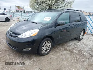 2010 Toyota Sienna XLE with VIN 5TDYK4CC1AS309856, listed as a IAAI auction lot 42089020 with 142,165 mi miles. Bid and sale history available at carsss.com. Image 17.