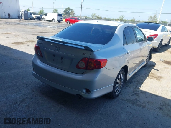 2009 Toyota Corolla with VIN 1NXBU40E99Z105346, listed as a IAAI auction lot 42062757 with 130,968 mi miles. Bid and sale history available at carsss.com. Image 4.