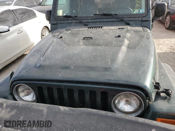 2003 Jeep Wrangler Sport with VIN 1J4FA49S43P301542, listed as a Copart auction lot 75704824 with Not Provided miles and Salvage Title. Bid and sale history available at carsss.com. Image 5.