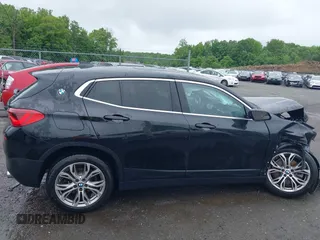 2020 BMW X2 sDrive28i z VIN WBXYH9C01L5P36225, wystawiony jako IAAI lot #39421264 z przebiegiem 70 043 mil mil oraz . Historia ofert i sprzedaży dostępna na DreamBid. Obrazek 13.