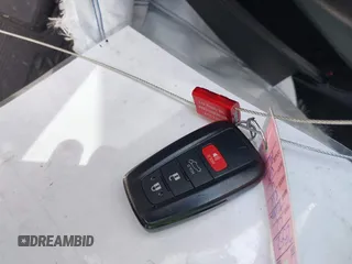 2024 Toyota RAV4 Hybrid XSE with VIN 2T3E6RFV9RW077941, listed as a IAAI auction lot 42012134 with 31,009 mi miles and . Bid and sale history available at DreamBid. Image 11.