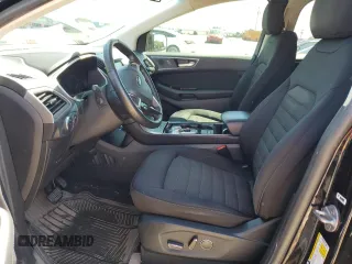 2019 Ford Edge SEL z VIN 2FMPK3J9XKBC19570, wystawiony jako Copart lot #55272125 z przebiegiem 69 602 mil mil oraz Szkoda całkowita • Salvage title. Historia ofert i sprzedaży dostępna na DreamBid. Obrazek 7.