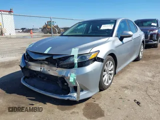 2020 Toyota Camry LE with VIN 4T1C11AK4LU302190, listed as a IAAI auction lot 41625262 with 61,337 mi miles. Bid and sale history available at carsss.com. Image 2.