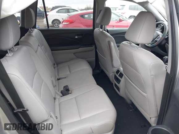 2017 Honda Pilot EX-L with VIN 5FNYF6H5XHB014067, listed as a IAAI auction lot 42083742 with 143,043 mi miles and . Bid and sale history available at DreamBid. Image 8.