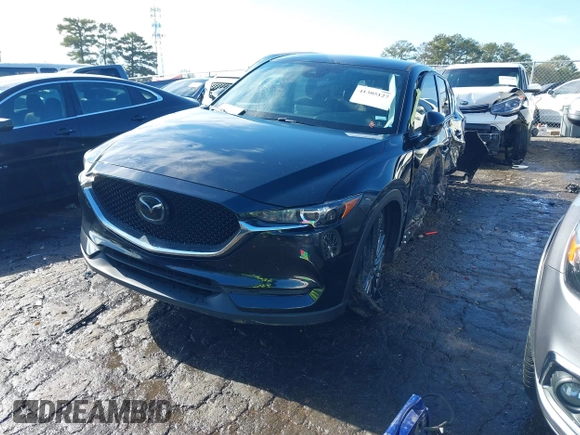 2021 Mazda CX-5 Touring with VIN JM3KFBCM9M0483082, listed as a IAAI auction lot 41305127 with 42,926 mi miles. Bid and sale history available at carsss.com. Image 17.