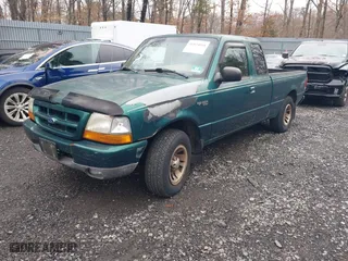 1999 Ford Ranger XL with VIN 1FTYR14V7XTA65621, listed as a IAAI auction lot 41824018 with 159,931 mi miles. Bid and sale history available at carsss.com. Image 2.