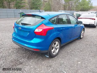 2012 Ford Focus SE with VIN 1FAHP3K23CL125307, listed as a IAAI auction lot 42056610 with 122,204 mi miles. Bid and sale history available at carsss.com. Image 4.