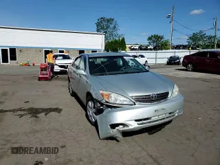 2004 Toyota Camry LE z VIN JTDBE32K640270298, wystawiony jako Copart lot #58800955 z przebiegiem 79 064 mil mil oraz Szkoda całkowita • Salvage title. Historia ofert i sprzedaży dostępna na DreamBid. Obrazek 13.