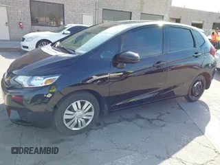 2015 Honda Fit LX with VIN 3HGGK5G5XFM737172, listed as a IAAI auction lot 42053332 with 80,690 mi miles. Bid and sale history available at carsss.com. Image 17.