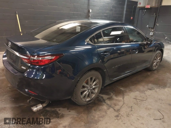 2018 Mazda Mazda6 Sport with VIN JM1GL1UMXJ1330989, listed as a IAAI auction lot 41355353 with 52,869 mi miles. Bid and sale history available at carsss.com. Image 4.