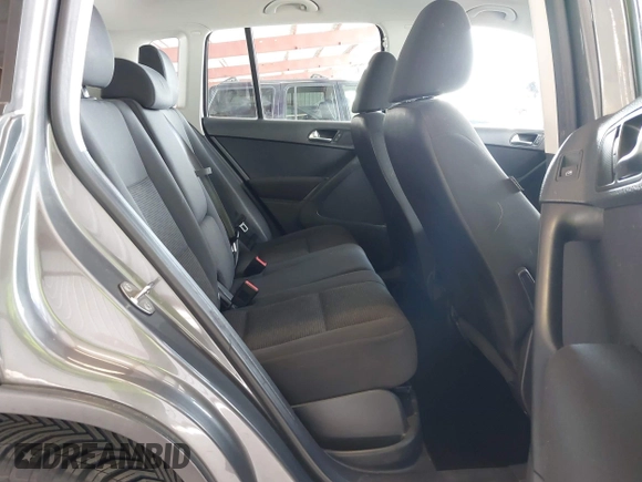 2012 Volkswagen Tiguan SEL with VIN WVGAV7AX1CW004744, listed as a IAAI auction lot 41924952 with 100,964 mi miles and . Bid and sale history available at DreamBid. Image 8.