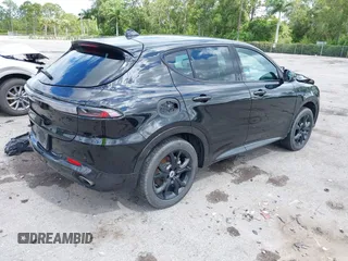 2024 Dodge Hornet R/T with VIN ZACPDFCW9R3A16217, listed as a IAAI auction lot 42589754 with 14,484 mi miles and . Bid and sale history available at DreamBid. Image 4.