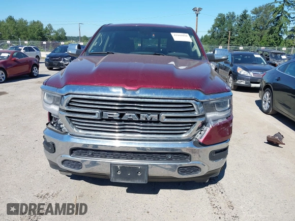2019 Ram 1500 Laramie with VIN 1C6SRFJT2KN677400, listed as a IAAI auction lot 42441010 with 76,750 mi miles and . Bid and sale history available at DreamBid. Image 13.
