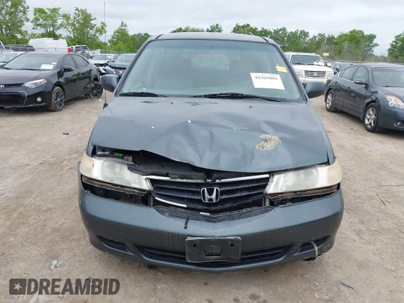 2003 Honda Odyssey EX-L z VIN 5FNRL18053B133092, wystawiony jako IAAI lot #42365081 z przebiegiem 239 753 mil mil oraz . Historia ofert i sprzedaży dostępna na DreamBid. Obrazek 6.