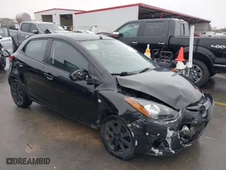 2014 Mazda Mazda2 Touring with VIN JM1DE1LZ2E0179569, listed as a IAAI auction lot 41446390 with 89,145 mi miles. Bid and sale history available at carsss.com. Image 1.