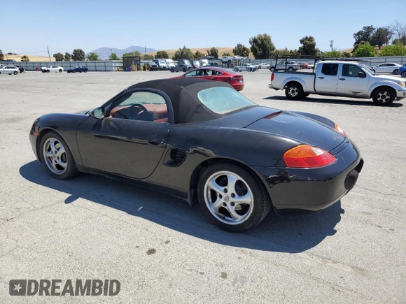 2000 Porsche Boxster с VIN WP0CA2983YU620909, выставлен на аукционе Copart как лот 58087035 с пробегом 99 845 миль миль и Чистый • Clean title. История ставок и продаж доступна на DreamBid. Изображение 2.