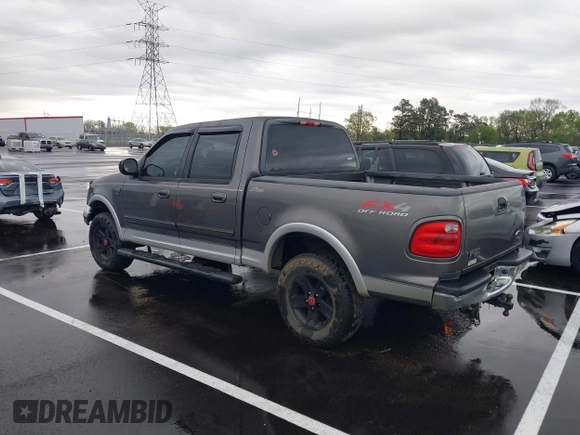 2003 Ford F-150 XLT with VIN 1FTRW08L43KD25506, listed as a IAAI auction lot 41941847 with 1 mi miles. Bid and sale history available at carsss.com. Image 3.